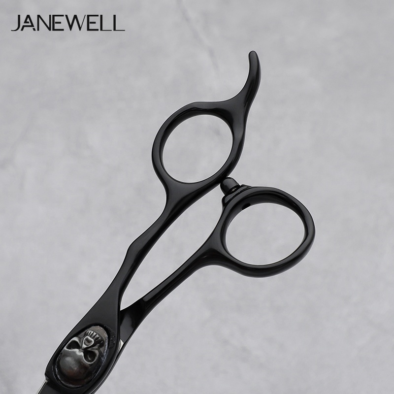 Professional 440C black barber shears with skull design pattern, 6.0 inch hair shears for barbers and salon hairdressing. - thumbnail 4